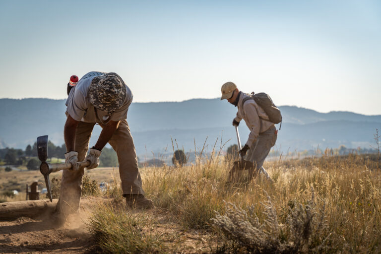 Volunteers working on the trail