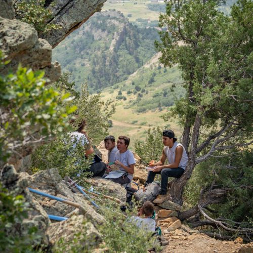 Team of volunteers resting on the trail